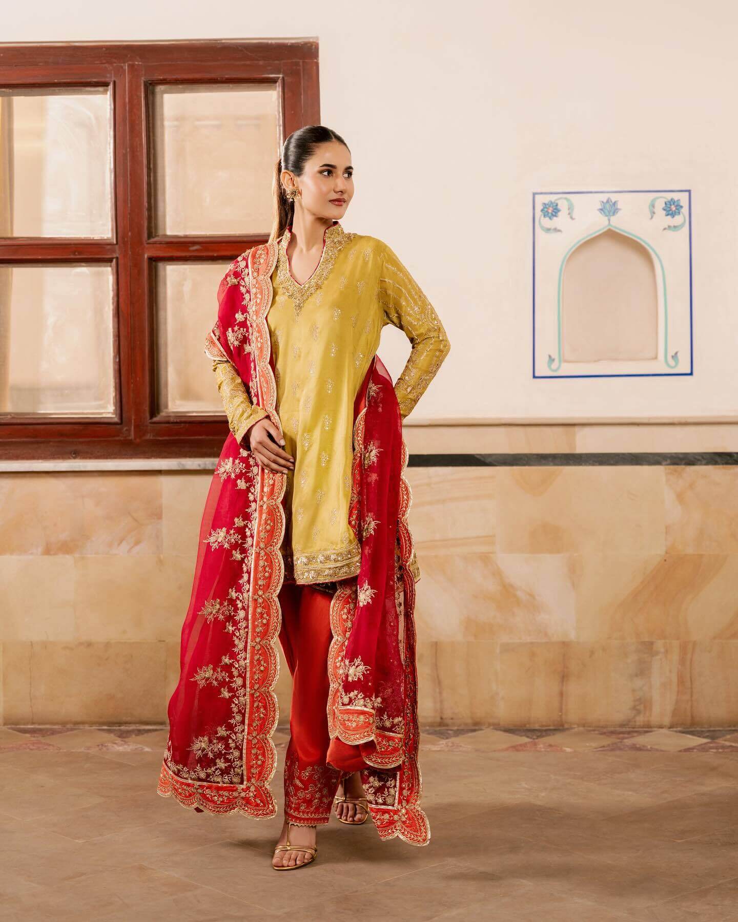 Model in a yellow traditional dress