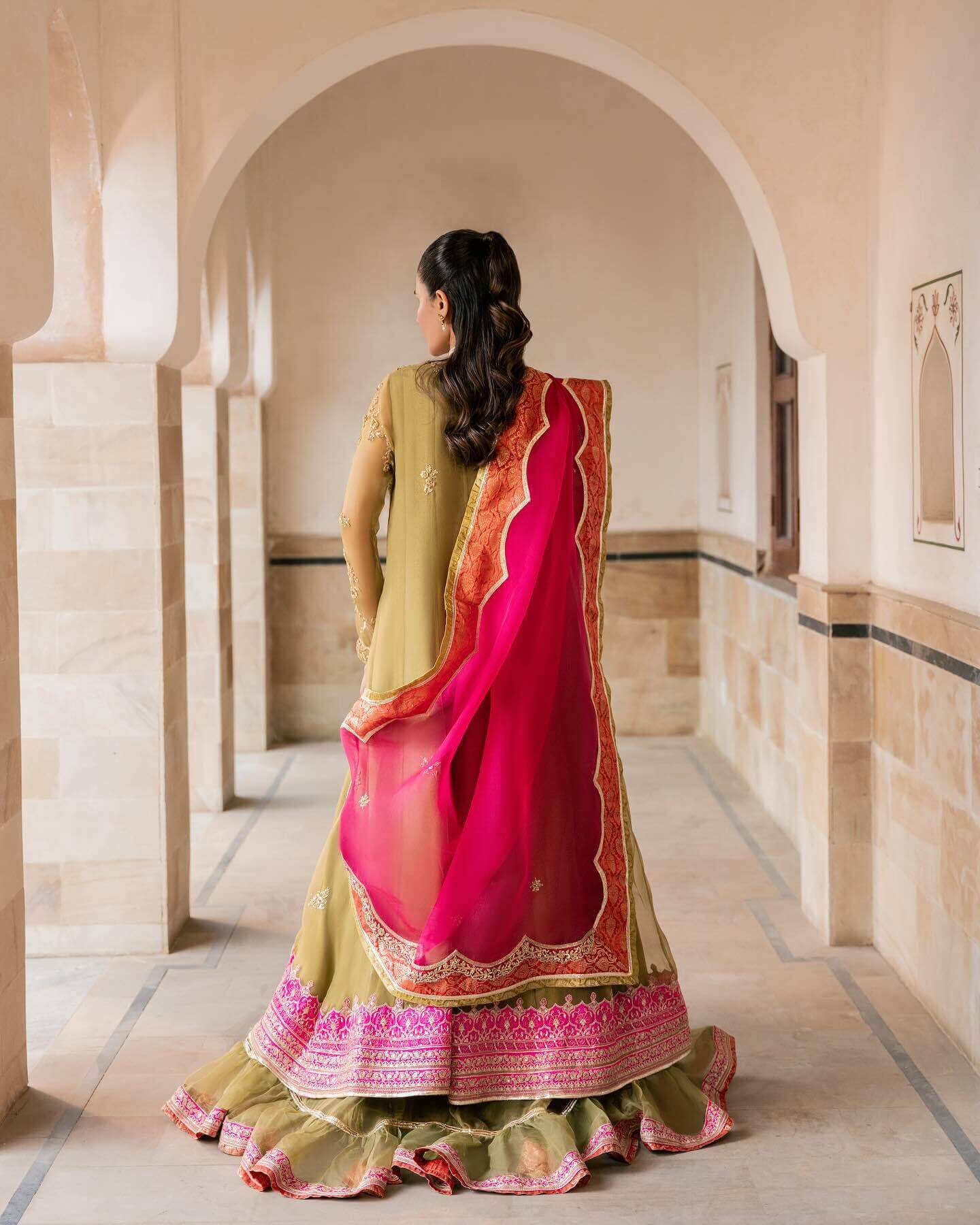 Model in a pink traditional dress